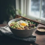 Beef Ramen Noodles – Easy, Saucy, One-Skillet Comfort 6 beef ramen noodles recipe card beside finished bowl